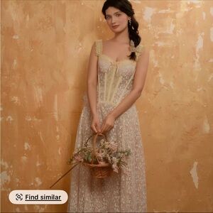 Elegant Lace Gown with Floral Details